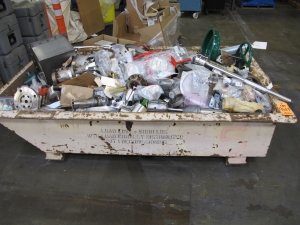 SCRAPPERS DELIGHT! FULL SKIFF STACKED WITH MISC. STAINLESS STEEL, BRASS, BRONZE, AND HEAVY STEEL. SKIFF NOT INCLUDED. LOADING & HANDLING FEE $30-4617